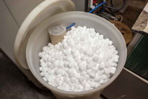 A barrel of salt blocks for the water softener