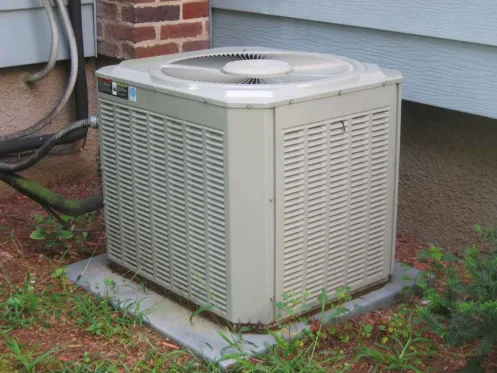 central air conditioning unit in a residential yard